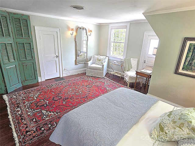 1051 14th Avenue Dr NW, Hickory, NC 28601 - bedroom with ornamental molding, baseboards, and wood finished floors