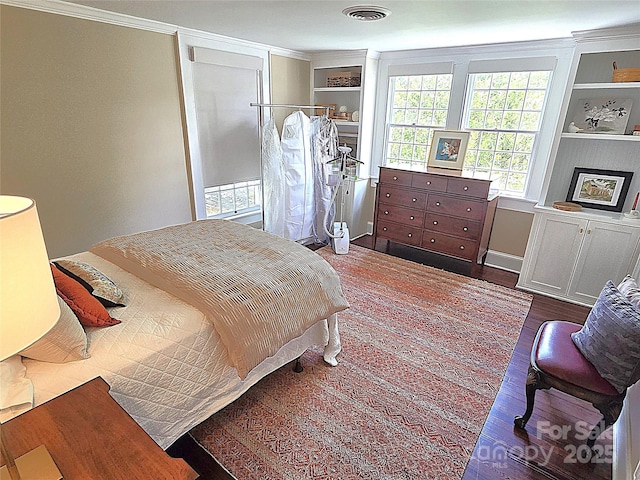 1051 14th Avenue Dr NW, Hickory, NC 28601 - bedroom with ornamental molding and wood finished floors