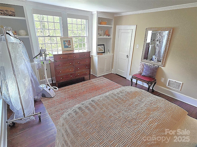 1051 14th Avenue Dr NW, Hickory, NC 28601 - bedroom with wood finished floors, crown molding, and baseboards