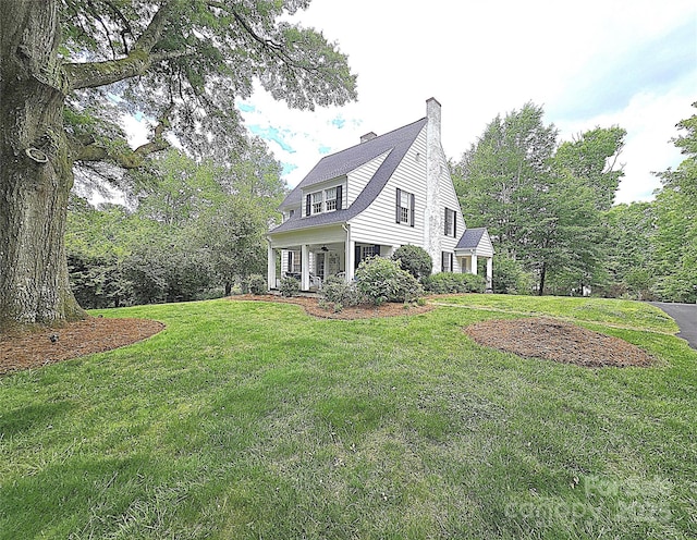 1051 14th Avenue Dr NW, Hickory, NC 28601 - view of side of property with a yard and a chimney