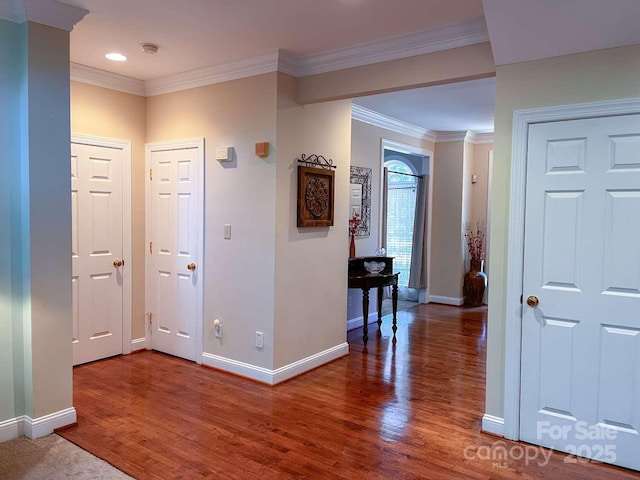 15494 Donnington Dr, Charlotte, NC 28277 - hallway with baseboards, wood finished floors, crown molding, and recessed lighting