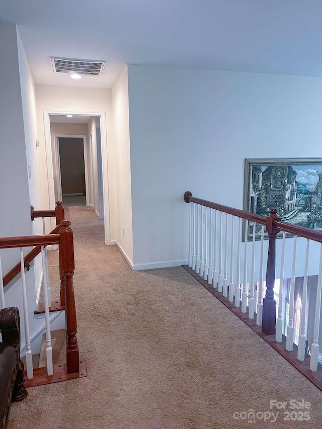 15494 Donnington Dr, Charlotte, NC 28277 - hallway featuring carpet, an upstairs landing, and baseboards
