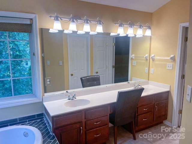15494 Donnington Dr, Charlotte, NC 28277 - full bath featuring double vanity, a bath, tile patterned flooring, and plenty of natural light