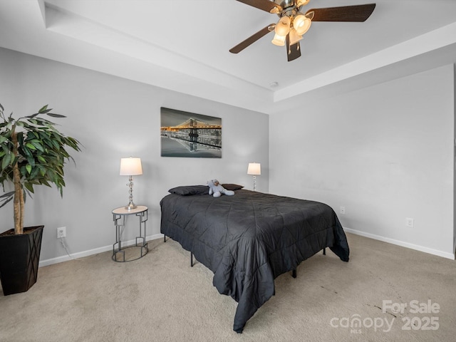 10426 Kempsford Dr, Charlotte, NC 28262 - bedroom featuring baseboards, carpet floors, a raised ceiling, and a ceiling fan