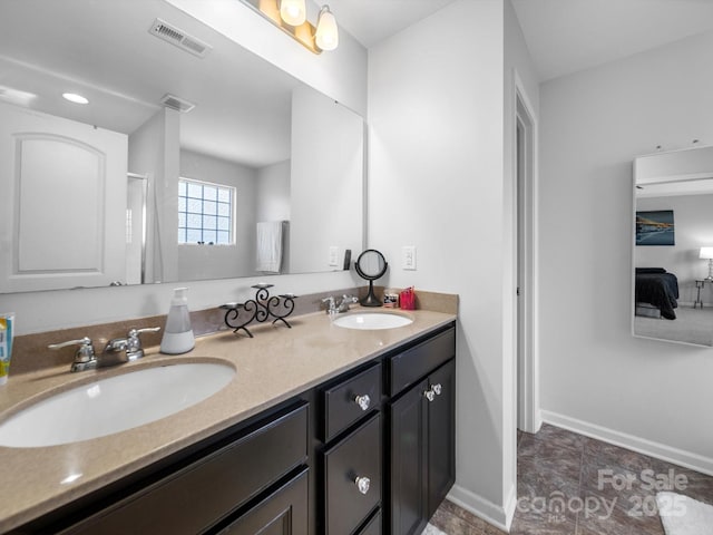 10426 Kempsford Dr, Charlotte, NC 28262 - full bath featuring double vanity, ensuite bathroom, and baseboards