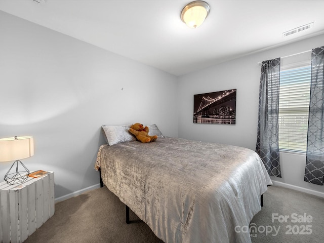 10426 Kempsford Dr, Charlotte, NC 28262 - carpeted bedroom with baseboards