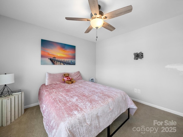 10426 Kempsford Dr, Charlotte, NC 28262 - carpeted bedroom featuring baseboards and ceiling fan
