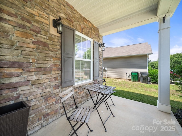 10426 Kempsford Dr, Charlotte, NC 28262 - covered porch with a yard