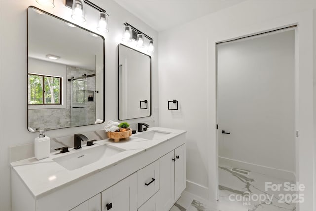 5033 Waxhaw Indian Trail Rd, Matthews, NC 28104 - full bathroom featuring marble look tile flooring, baseboards, double vanity, and a shower stall