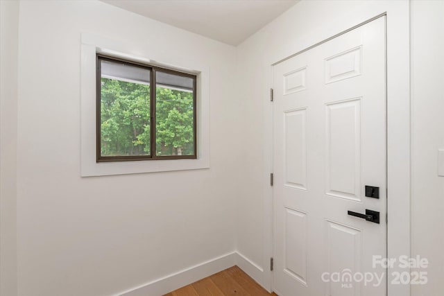 5033 Waxhaw Indian Trail Rd, Matthews, NC 28104 - empty room featuring baseboards and light wood-type flooring