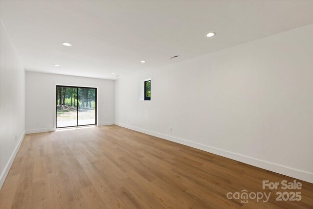 5033 Waxhaw Indian Trail Rd, Matthews, NC 28104 - unfurnished room featuring light wood-style flooring, baseboards, and recessed lighting