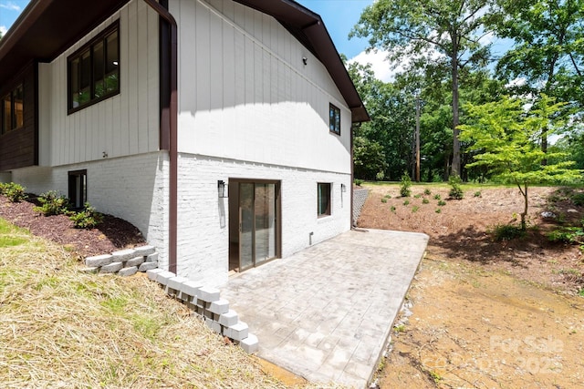 5033 Waxhaw Indian Trail Rd, Matthews, NC 28104 - view of side of home featuring a patio