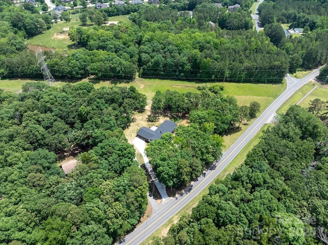 5033 Waxhaw Indian Trail Rd, Matthews, NC 28104 - aerial view of property's location featuring a heavily wooded area