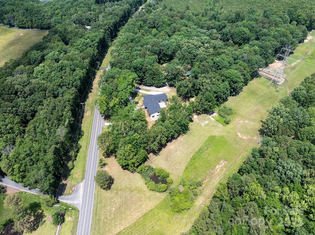 5033 Waxhaw Indian Trail Rd, Matthews, NC 28104 - aerial overview of property's location with a heavily wooded area