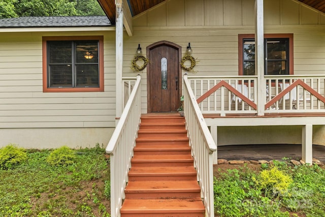3540 Fork Creek Rd, Saluda, NC 28773 - doorway to property with board and batten siding and roof with shingles