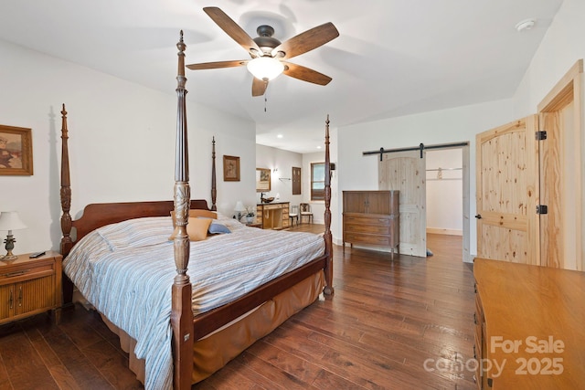 3540 Fork Creek Rd, Saluda, NC 28773 - bedroom with dark wood finished floors and a barn door