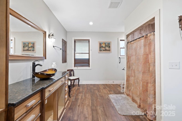 3540 Fork Creek Rd, Saluda, NC 28773 - full bathroom with vanity, wood finished floors, recessed lighting, and a shower with shower curtain