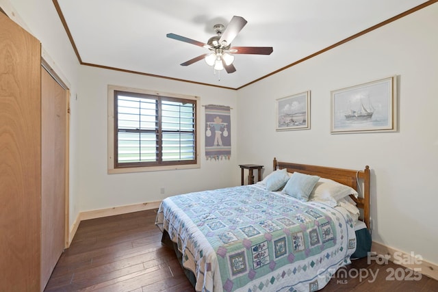 3540 Fork Creek Rd, Saluda, NC 28773 - bedroom with dark wood-style flooring, a closet, ornamental molding, and a ceiling fan