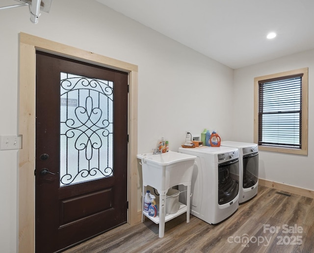 3540 Fork Creek Rd, Saluda, NC 28773 - washroom with wood finished floors, washing machine and dryer, and recessed lighting