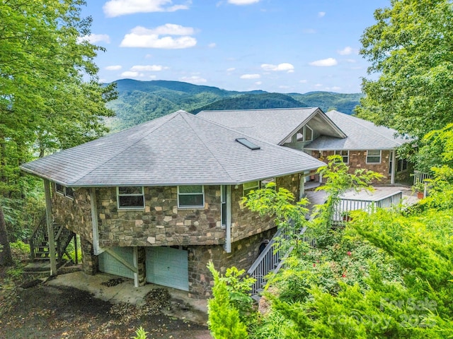 698 Youngs Mountain Dr, Lake Lure, NC 28746 - view of front of home featuring stairway, stone siding, a mountain view, and a shingled roof
