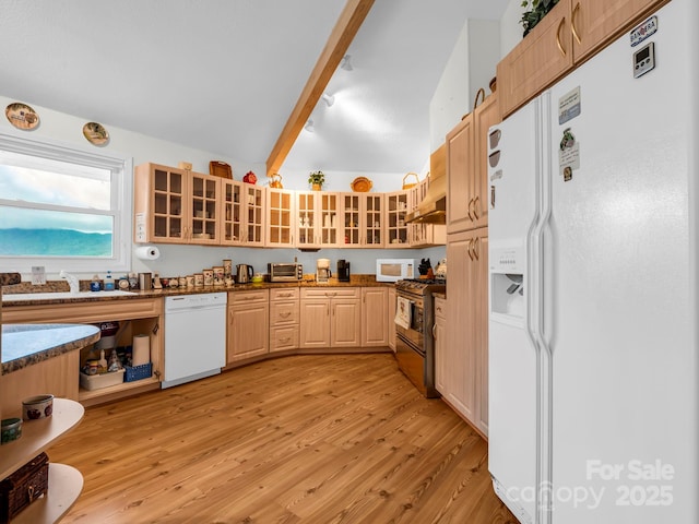 698 Youngs Mountain Dr, Lake Lure, NC 28746 - kitchen featuring white appliances, dark countertops, light wood finished floors, beamed ceiling, and glass insert cabinets