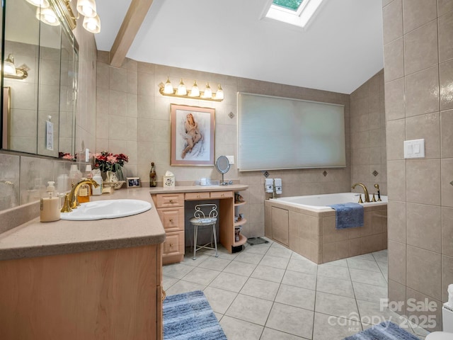 698 Youngs Mountain Dr, Lake Lure, NC 28746 - full bathroom featuring tile walls, tile patterned floors, vanity, a garden tub, and vaulted ceiling