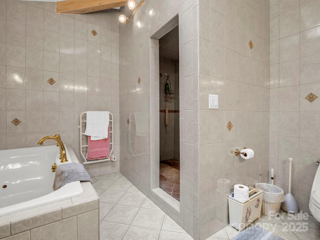 698 Youngs Mountain Dr, Lake Lure, NC 28746 - full bath with tile walls, a garden tub, tile patterned flooring, and a tile shower