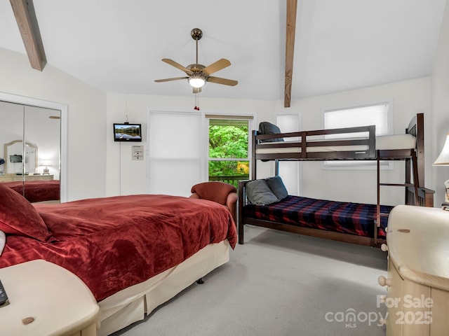 698 Youngs Mountain Dr, Lake Lure, NC 28746 - bedroom featuring beamed ceiling, carpet flooring, and a ceiling fan
