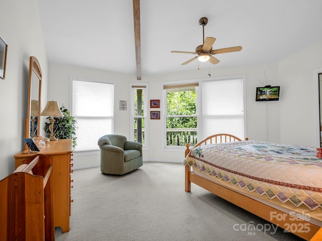 698 Youngs Mountain Dr, Lake Lure, NC 28746 - bedroom with carpet floors, beamed ceiling, and ceiling fan