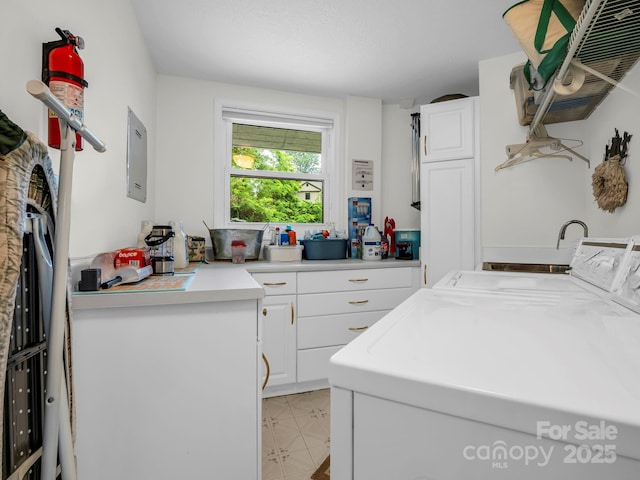 698 Youngs Mountain Dr, Lake Lure, NC 28746 - laundry area with separate washer and dryer, cabinet space, light floors, and electric panel