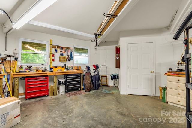 698 Youngs Mountain Dr, Lake Lure, NC 28746 - garage featuring a workshop area