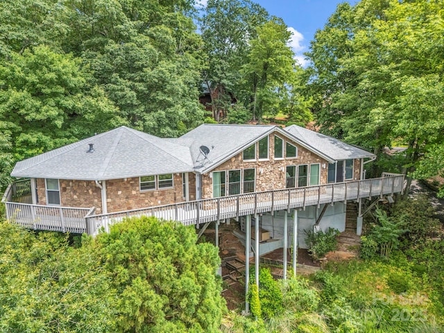 698 Youngs Mountain Dr, Lake Lure, NC 28746 - rear view of property with stone siding, a deck, and a shingled roof