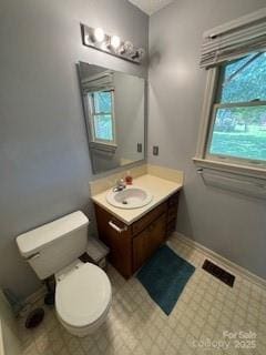 2669 Icard Rhodhiss Rd, Connelly Springs, NC 28612 - bathroom featuring vanity, toilet, tile patterned floors, and baseboards