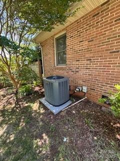 2669 Icard Rhodhiss Rd, Connelly Springs, NC 28612 - exterior view of brick siding and central air condition unit
