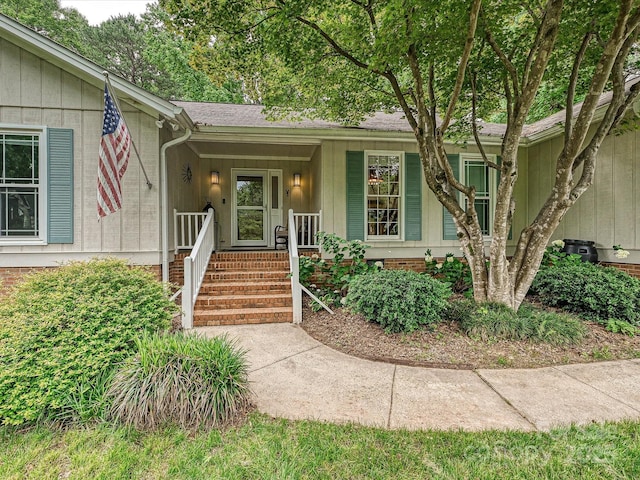 2911 Butter Churn Ln, Matthews, NC 28105 - doorway to property with covered porch