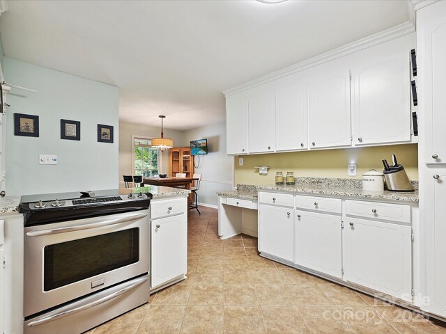 2911 Butter Churn Ln, Matthews, NC 28105 - kitchen featuring electric range, white cabinetry, light tile patterned flooring, and light stone counters
