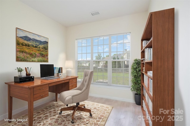 2013 Arbor Crest Ct, Charlotte, NC 28262 - office area with light wood-style flooring and baseboards