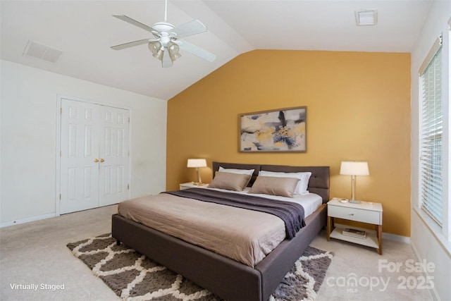 2013 Arbor Crest Ct, Charlotte, NC 28262 - bedroom with carpet flooring, lofted ceiling, ceiling fan, a closet, and baseboards