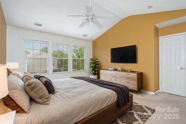 2013 Arbor Crest Ct, Charlotte, NC 28262 - bedroom with vaulted ceiling, light colored carpet, a ceiling fan, and baseboards