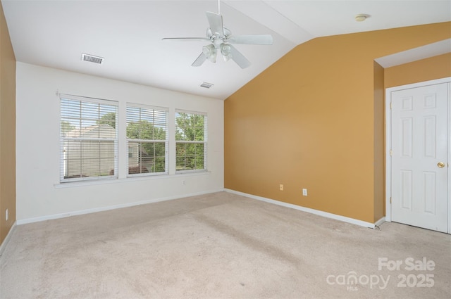 2013 Arbor Crest Ct, Charlotte, NC 28262 - carpeted empty room featuring lofted ceiling, ceiling fan, baseboards, and a smoke detector