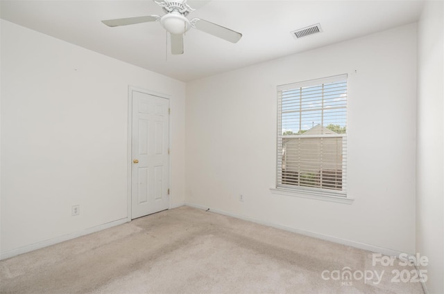 2013 Arbor Crest Ct, Charlotte, NC 28262 - unfurnished room featuring carpet floors, baseboards, and a ceiling fan