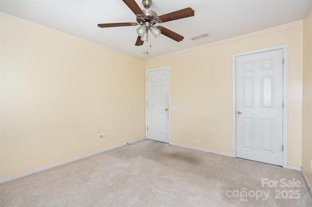 2013 Arbor Crest Ct, Charlotte, NC 28262 - unfurnished bedroom featuring light carpet, baseboards, and a ceiling fan