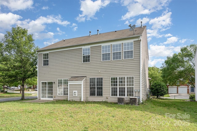 2013 Arbor Crest Ct, Charlotte, NC 28262 - rear view of house featuring a yard and central AC unit