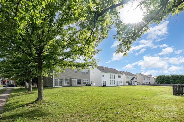 2013 Arbor Crest Ct, Charlotte, NC 28262 - rear view of property with a yard and a residential view