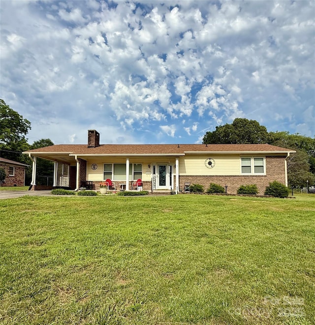 403 Kings Dr, Cherryville, NC 28021 - single story home featuring a chimney, an attached carport, a front yard, brick siding, and concrete driveway