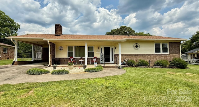 403 Kings Dr, Cherryville, NC 28021 - view of front of home featuring a porch, brick siding, a chimney, concrete driveway, and a front lawn