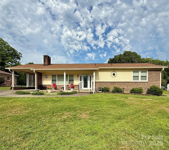 403 Kings Dr, Cherryville, NC 28021 - ranch-style home with covered porch, brick siding, and a front lawn