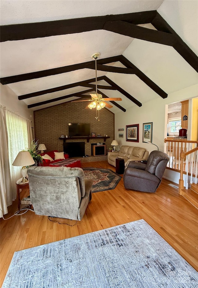 403 Kings Dr, Cherryville, NC 28021 - living room with ceiling fan, wood finished floors, and a fireplace