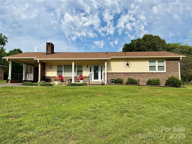 403 Kings Dr, Cherryville, NC 28021 - ranch-style house with brick siding, covered porch, a chimney, and a front yard