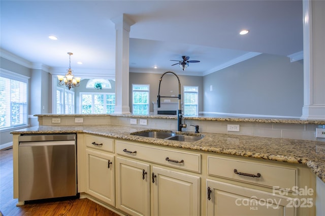 1009 Brookline Dr, Huntersville, NC 28078 - kitchen with dishwasher, ornamental molding, wood finished floors, a chandelier, and light stone counters